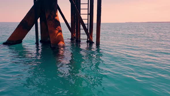 Pylons base of offshore oil platform or oil rig in open adriatic sea