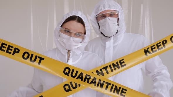 Portrait of Two Doctors in Protective Masks in a Laboratory