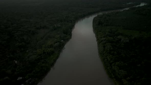 Aerial shot of dense forest and river of Amazon in brazil.