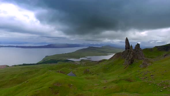 Dynamic sky over valley in Old man storr mountain in Scotland