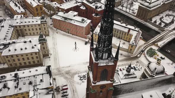 Rotating aerial view of beautiful Riddarholm Church in Sweden's historic Capital, Stockholm.