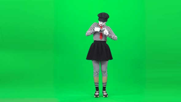 Mime Woman Acting Like She Photographer. Chroma Key. Full Length.