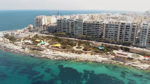 Aerial Clockwise Shot Of Exile Bay in Sliema Malta