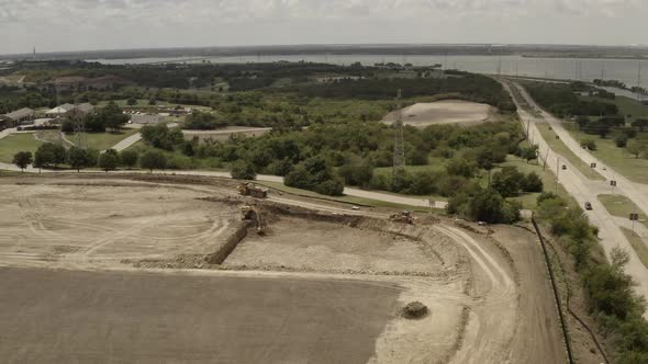 The expansion of a lake view town is under-weigh from an elevated point of view.