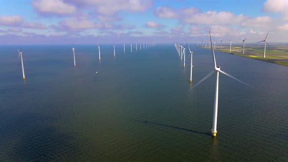 Wind Turbines in the Early Morning Wind Mill Park in the Netherlands