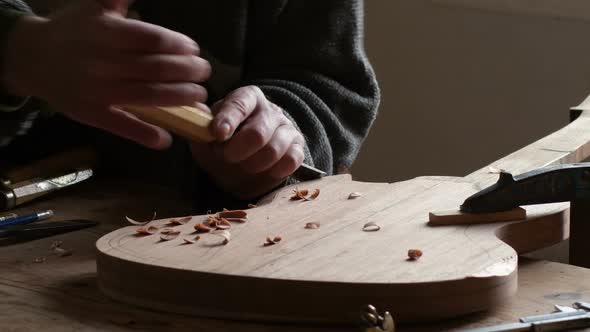 Luthier Working in a Electric Guitar