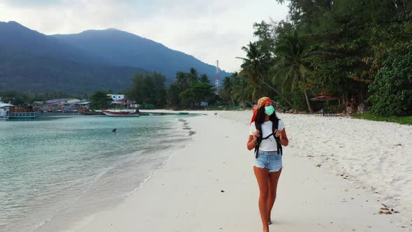 Girls best friends on idyllic tourist beach lifestyle by blue green sea with white sand background o