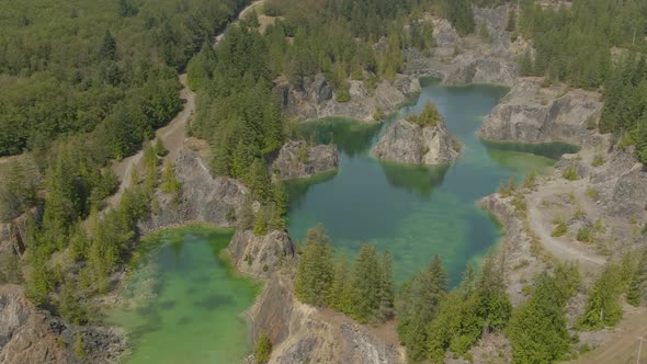 Beautiful Aerial View of the Colorful Lakes in the Canadian Nature during a sunny summer day. Taken