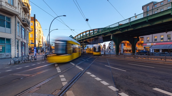 Day Time Lapse of Eberswalder Strasse with subway trams and cars Berlin, Germany