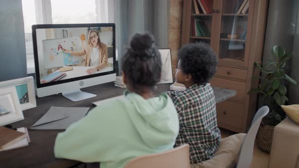 Afro Kids Studying Online Via Computer