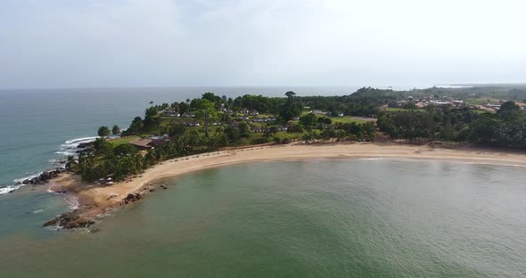 Aerial view of a resort and clean smooth beach in Mermaids Baby in San Pedro Ivory Coast