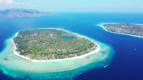 Natural drone abstract view of a white paradise beach and aqua turquoise water background in colorfu