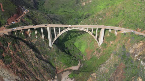  of Vehicles Driving By the Picturesque Big Sur Bridge Over the Canyon