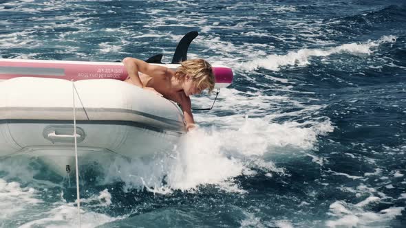 Kid Having Fun in Boat