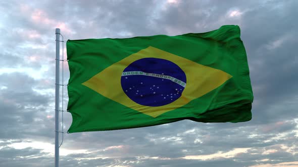 Realistic Flag of Brazil Waving in the Wind ep Against DeDramatic Sky