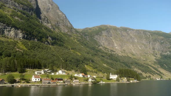 Small Village In Beautiful Mountain Range Fjords
