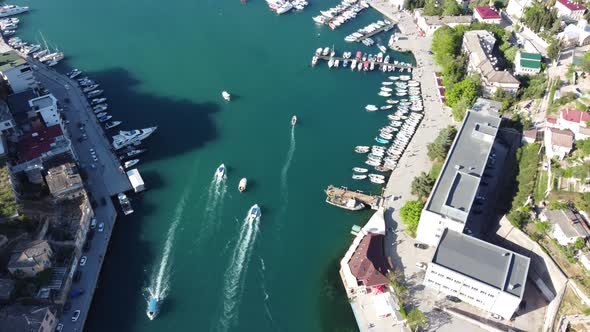 Aerial Panoramic View of Balaklava Landscape with Boats and Sea in Marina Bay on Sunny Day