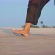 Feet of Active Senior Woman Practicing Tai Chi Gymnastic on Sandy Beach - VideoHive Item for Sale