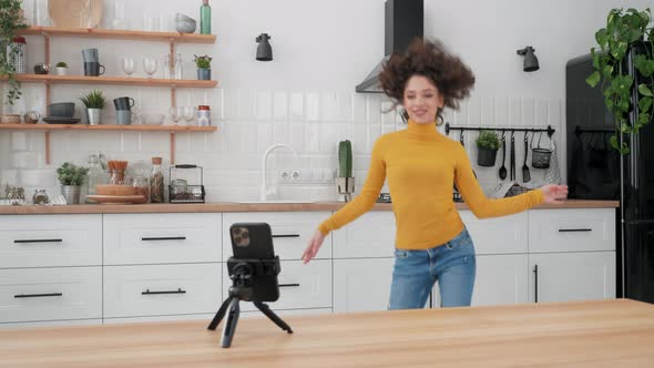Woman Blogger Dancing on Smartphone Camera Recording Video for Social Media