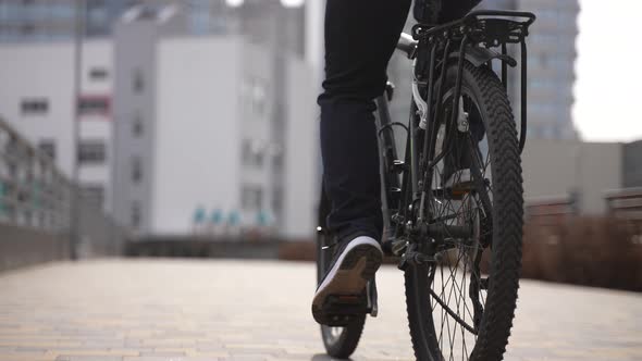 Delivery Man Delivering Order to Client By Bicycle