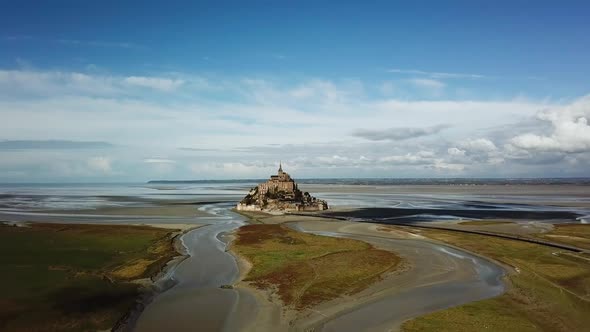 Aerial Drone View of Le Mont Saint Michel, Iconic Island and Monastery at Suny Day, Normandy, France