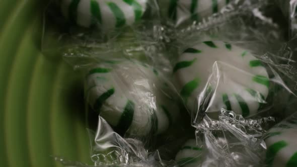 Rotating shot of spearmint hard candies - CANDY SPEARMINT 010