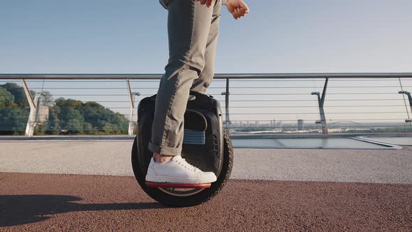 Pensioner Rides Electric Unicycle Trying to Keep Balance