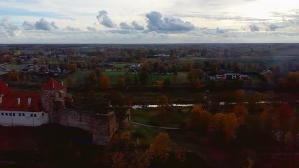 Bauska Medieval Castle Ruins Complex and Park From Above Aerial Shot 4K Video