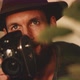 Man looking excited to capture view with vintage camera - VideoHive Item for Sale