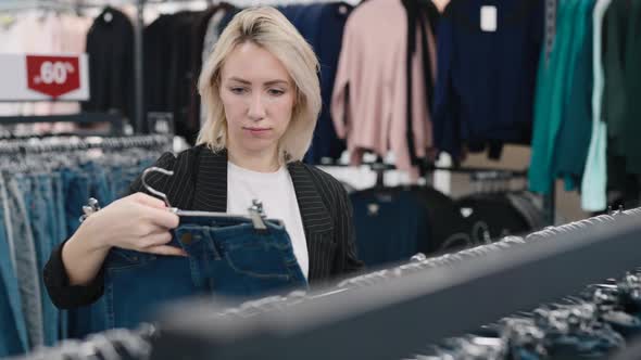 Elegant Woman in a Clothing Store