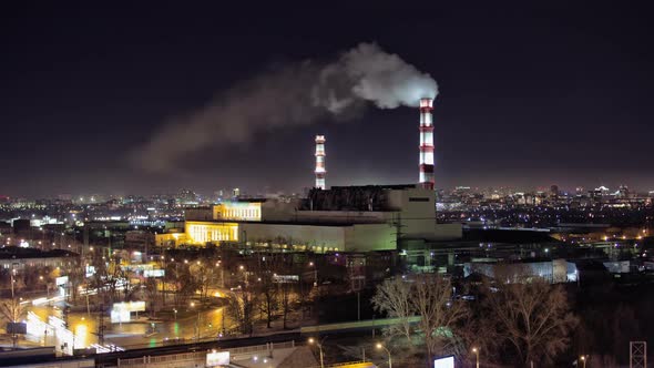 Time Lapse Of Factory Smoke In The City At Night