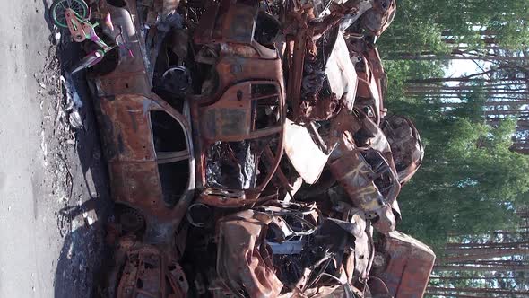 Vertical Video of Burnt Cars During the War in Ukraine