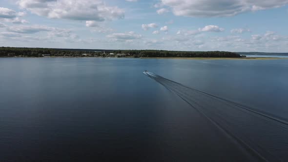 Speedboat Quickly Floats on the Water Surface