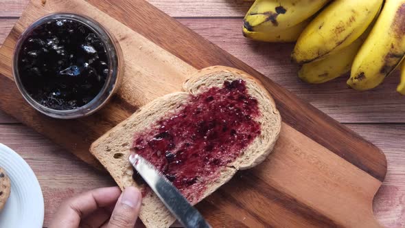 Blue Berry Jam on Bread on Table