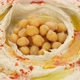 Hummus with smoked paprika, olive oil, whole chickpeas close up, rotation - VideoHive Item for Sale
