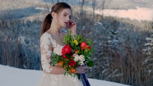 Bride with a Bouquet in Winter