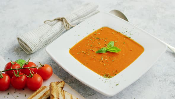 Tomato Soup Served with Crisp Bread