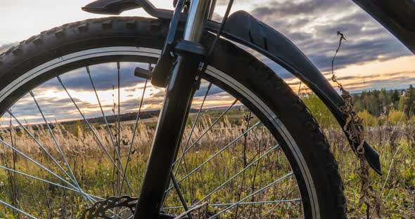 Camera Movement Along the Bicycle Against the Setting Sun, Beautiful Landscape, Time Lapse