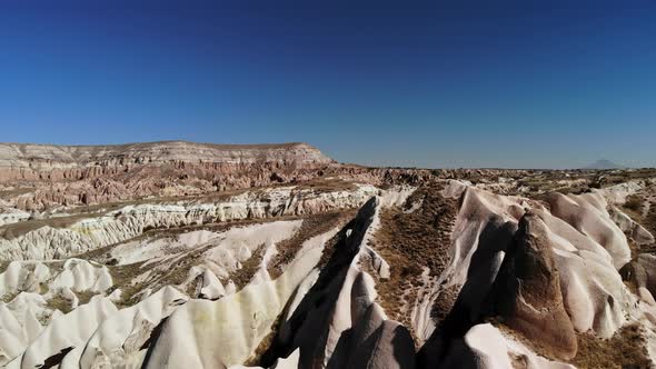 Aerial Mesmerizing View of Natural Formations of Mountains in Cappadocia Taken From Air