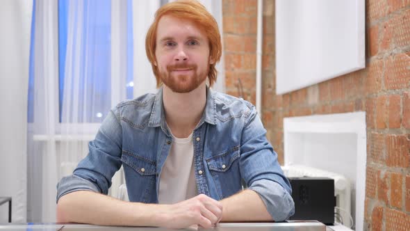 Portrait of Smiling Redhead Beard Man