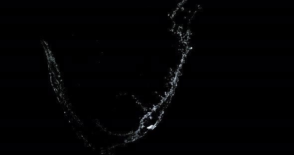 Water spurting out against Black Background, Slow motion 4K