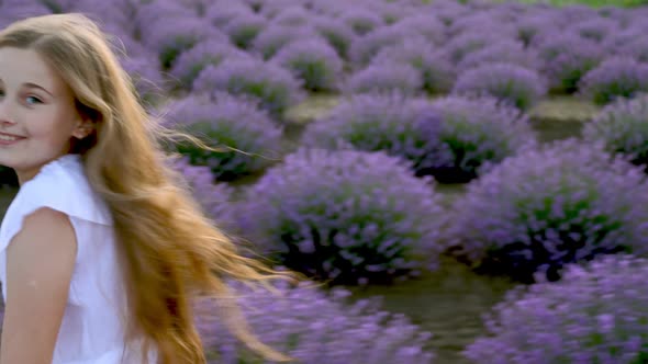 a Girl Running in a Lavender Field