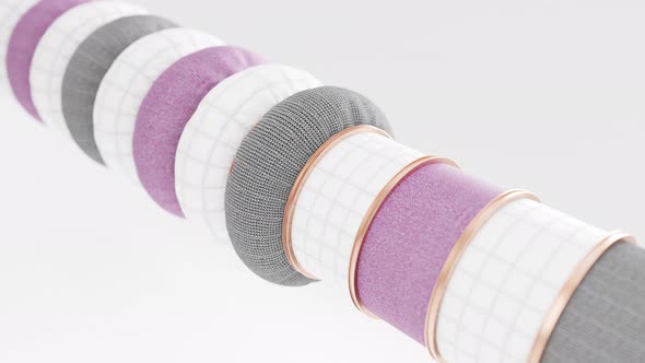 3D looped animation with gray, white and pink textile and golden rings inflating on white background