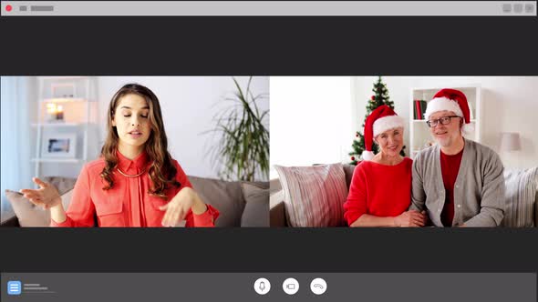 Woman Having Video Call with Family on Christmas