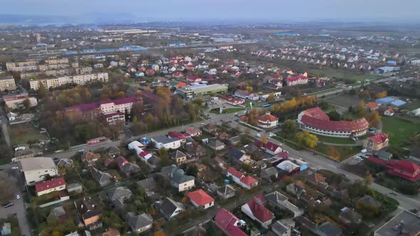 Morning Idyllic Sunrise Bright Horizon on Uzhgorod City with Houses Roofs in Zakarpattya Ukraine