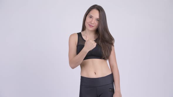 Young Happy Multi-ethnic Woman Giving Thumbs Up Ready for Gym