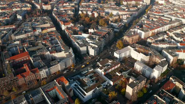 Typical Berlin Neighbourhood Residential Area in Sunny Daylight with View on Red Rooftops and Main