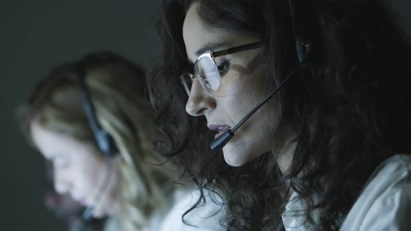 Businesswoman in Headset Working in Office