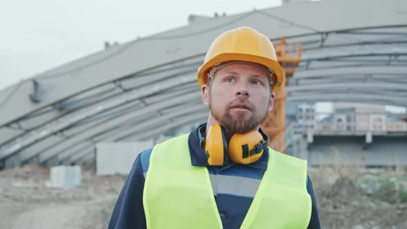 Construction Site Foreman Walking Outdoors