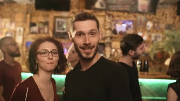 Portrait of Couple Having Fun at Bar